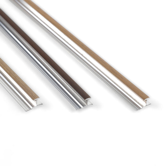 Three 6.3mm aluminum H-joint connection trims with light, medium, and dark wood-look finishes