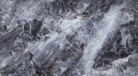 Close-up of the Zena black marble PVC wall panel pattern with layered gray, white, and fine gold veining