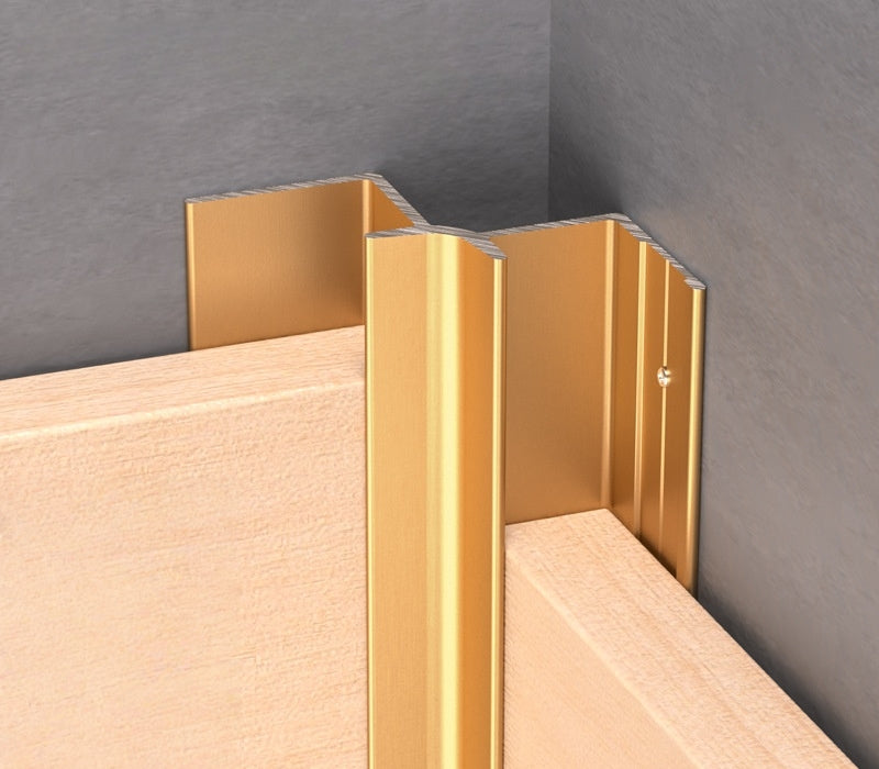 Gold aluminum wall panel inside corner trim installed between panels, durable metal edge strip for clean and stylish interior corner finishing