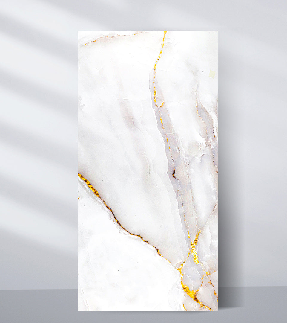 Pearl-white PVC marble sheet sample with translucent gray sections and polished gold veins
