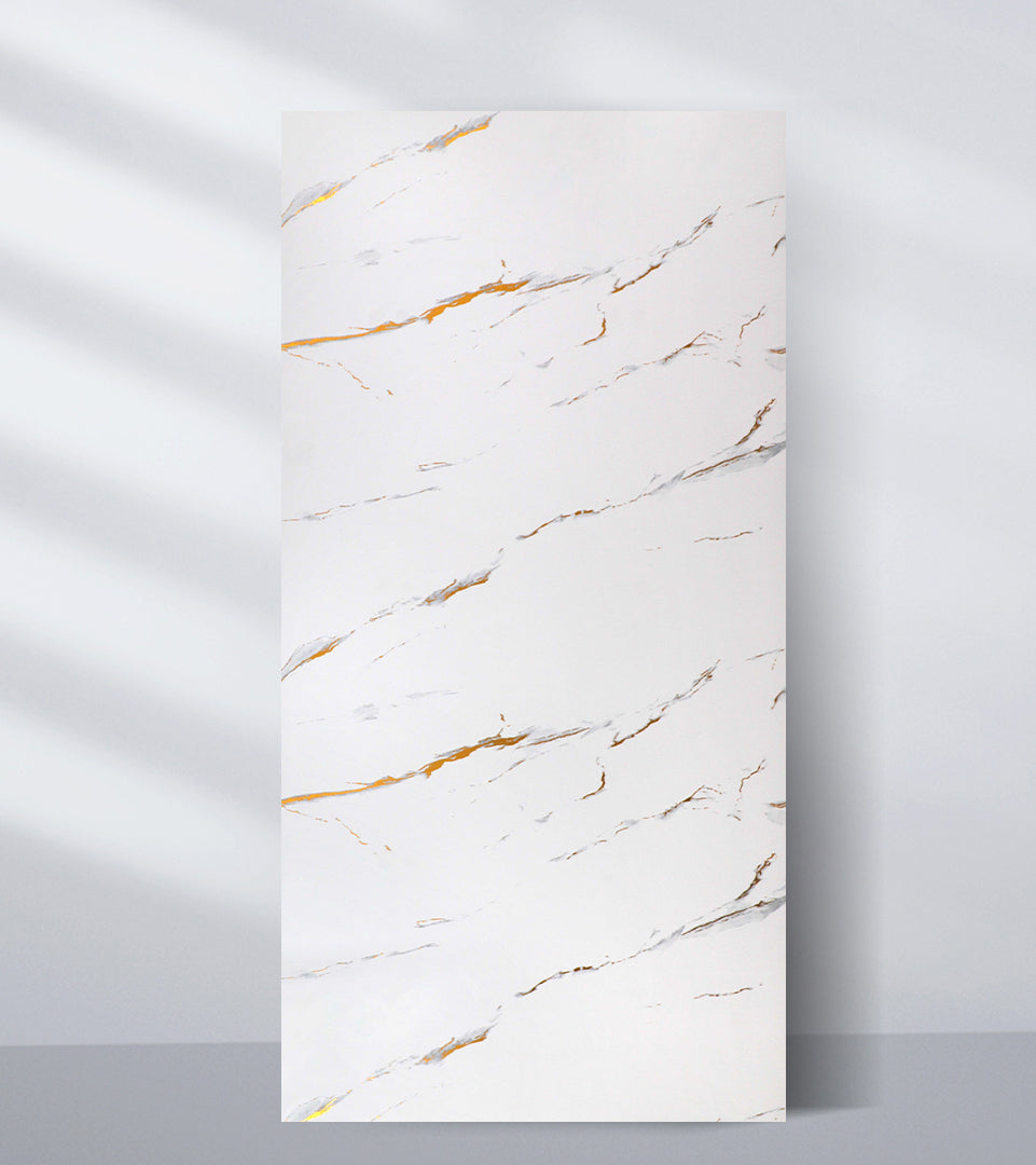 White PVC marble sheet sample with slim caramel-gold and gray diagonal veins