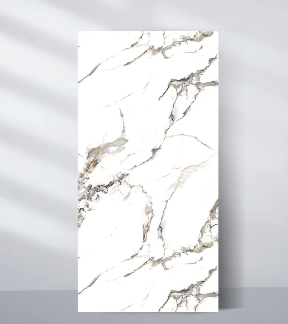 White PVC marble sheet sample with scattered gray, beige, and dark angular veins