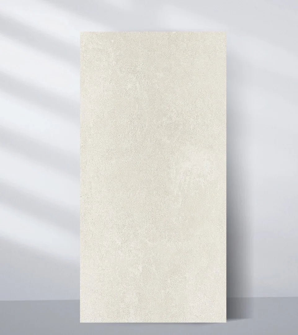 Warm off-white PVC marble sheet sample with a fine, evenly textured surface