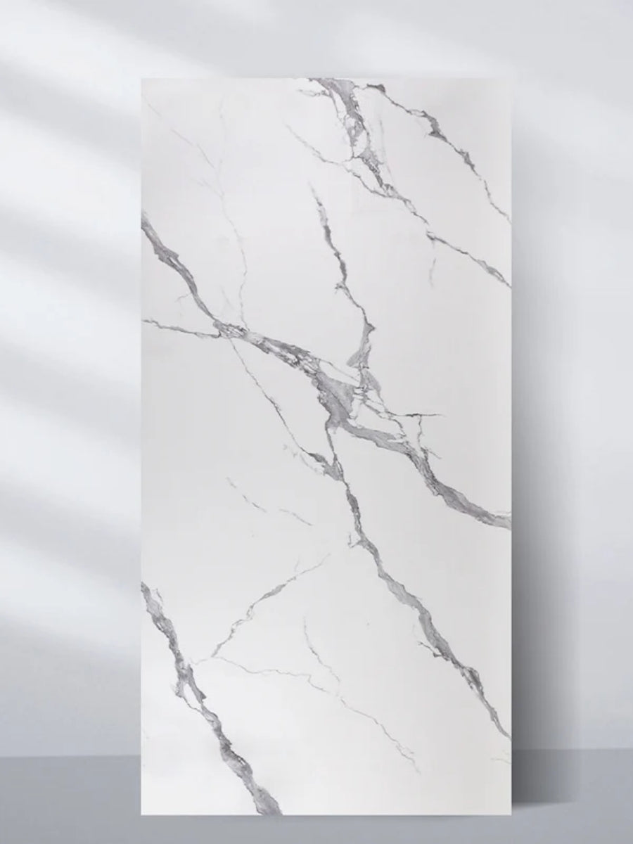 Calacatta Belga 4x8 ft PVC marble wall panel with a white surface and dramatic gray veining