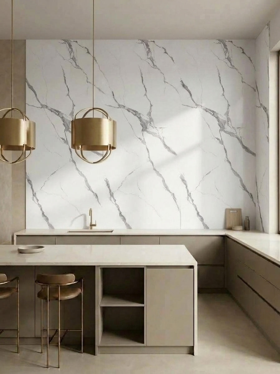 Modern kitchen with Calacatta Belga PVC marble wall panels above white counters and dark cabinetry