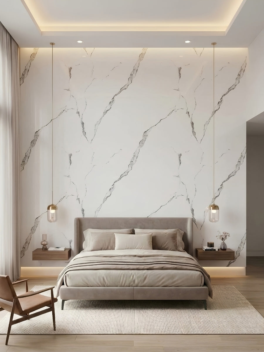 Calacatta Manhattan marble-look wall panels installed behind a bed with pendant lights and floating nightstands