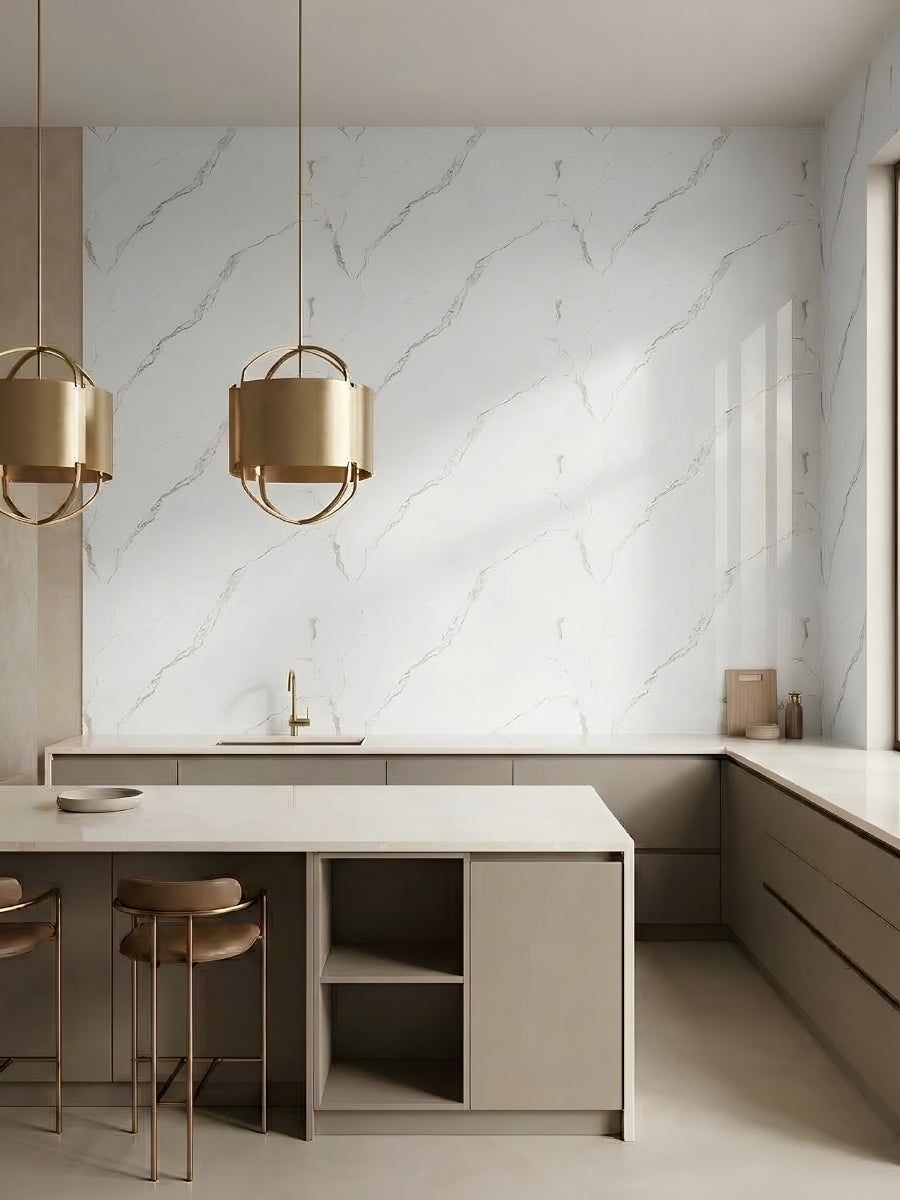Contemporary kitchen with Calacatta Manhattan marble-look wall panels above white counters and an island