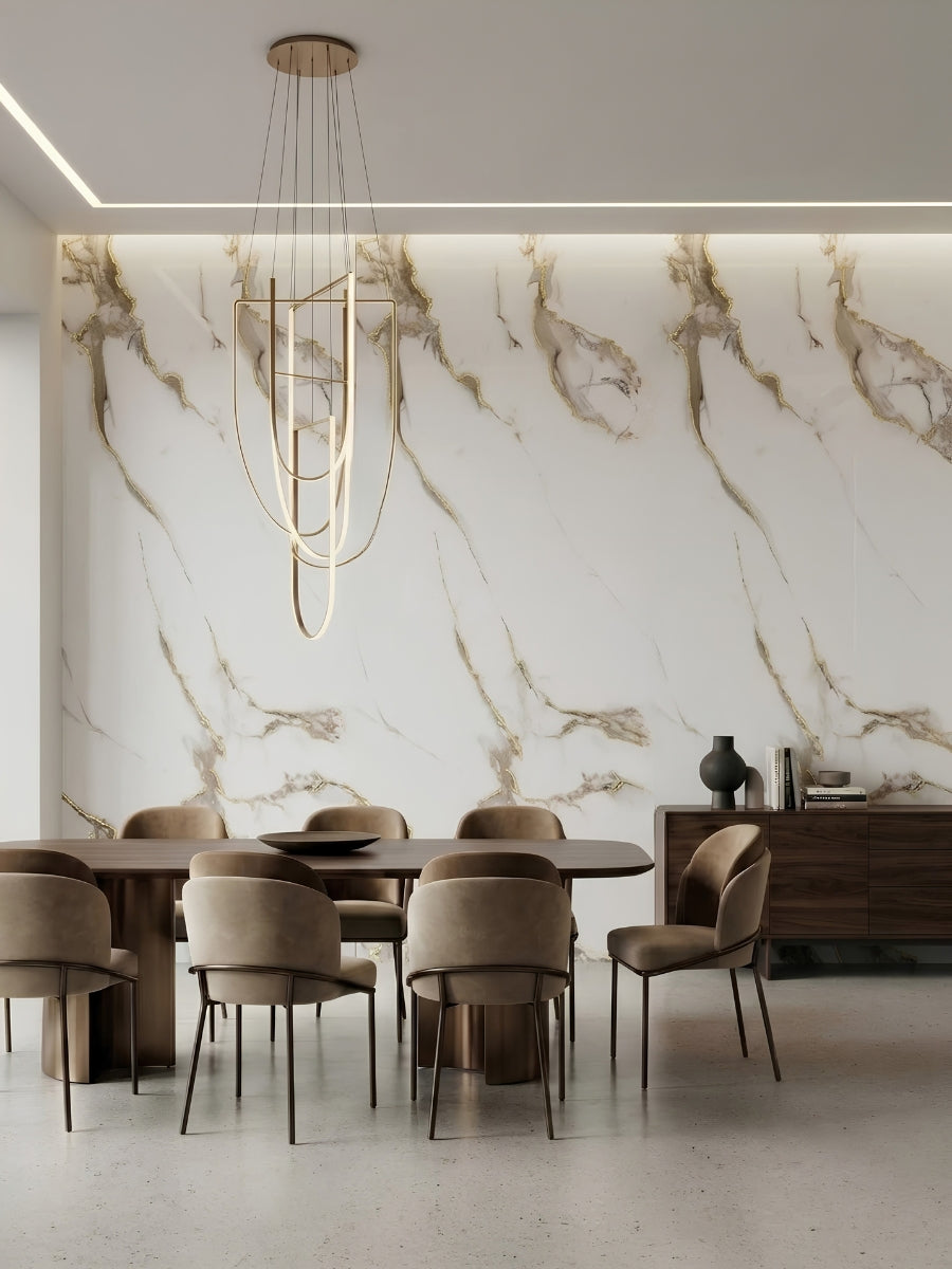 Dining room feature wall finished with white Calacatta Oro Gold Marble PVC panels and gold-gray veining