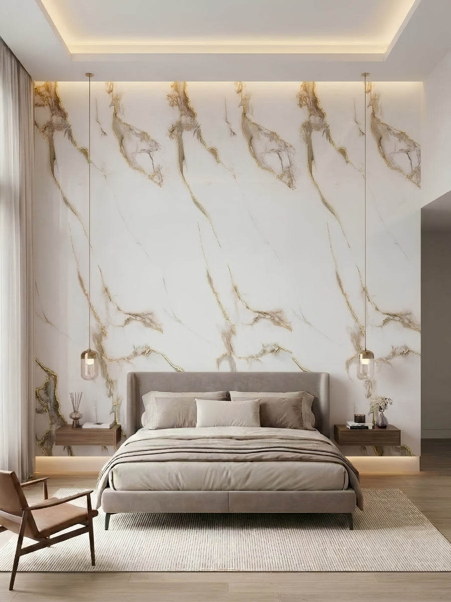 Bedroom accent wall clad in Calacatta Oro Gold Marble PVC panels with coordinated white, gray, and gold veining