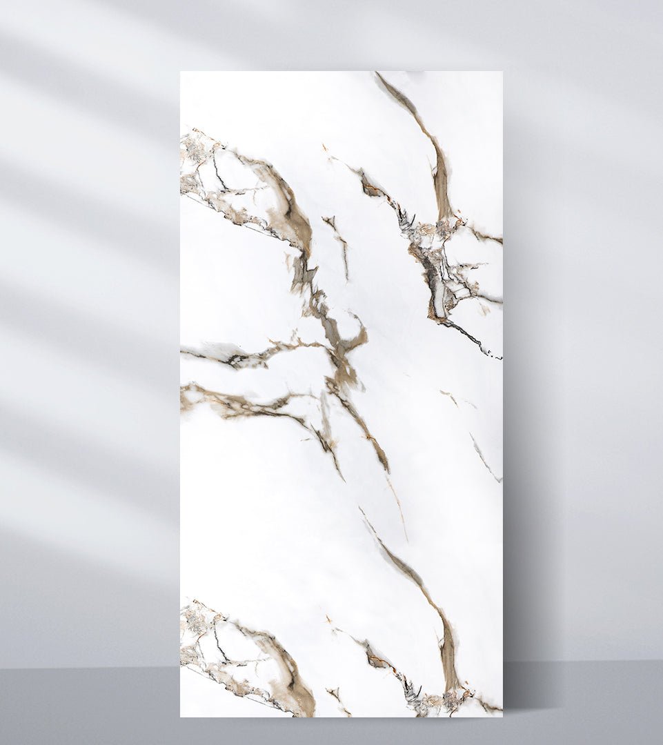 White PVC marble sheet sample with taupe, gray, and gold veins across an open surface