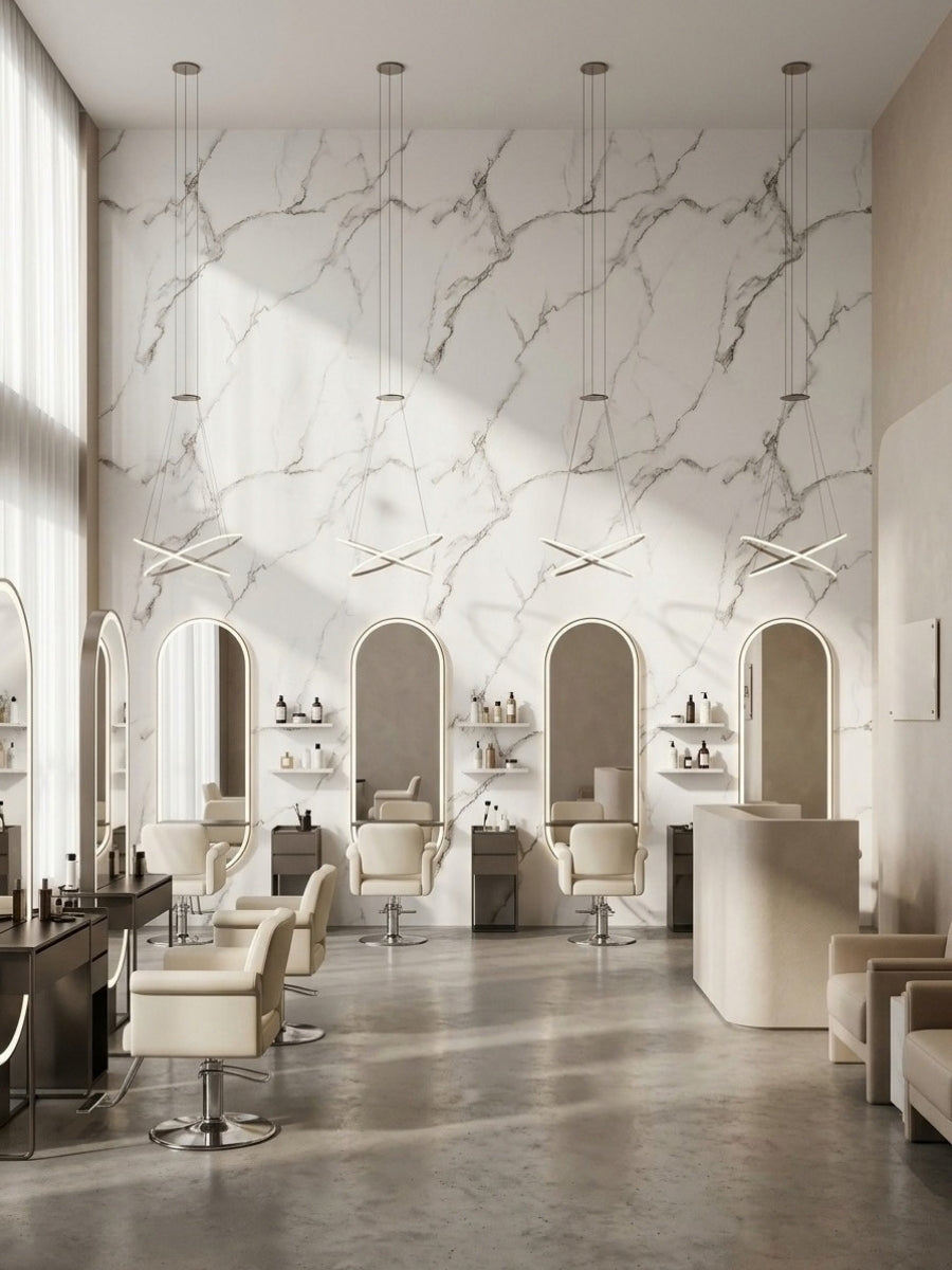 Calacatta White marble-look PVC wall panels installed in a bright modern salon
