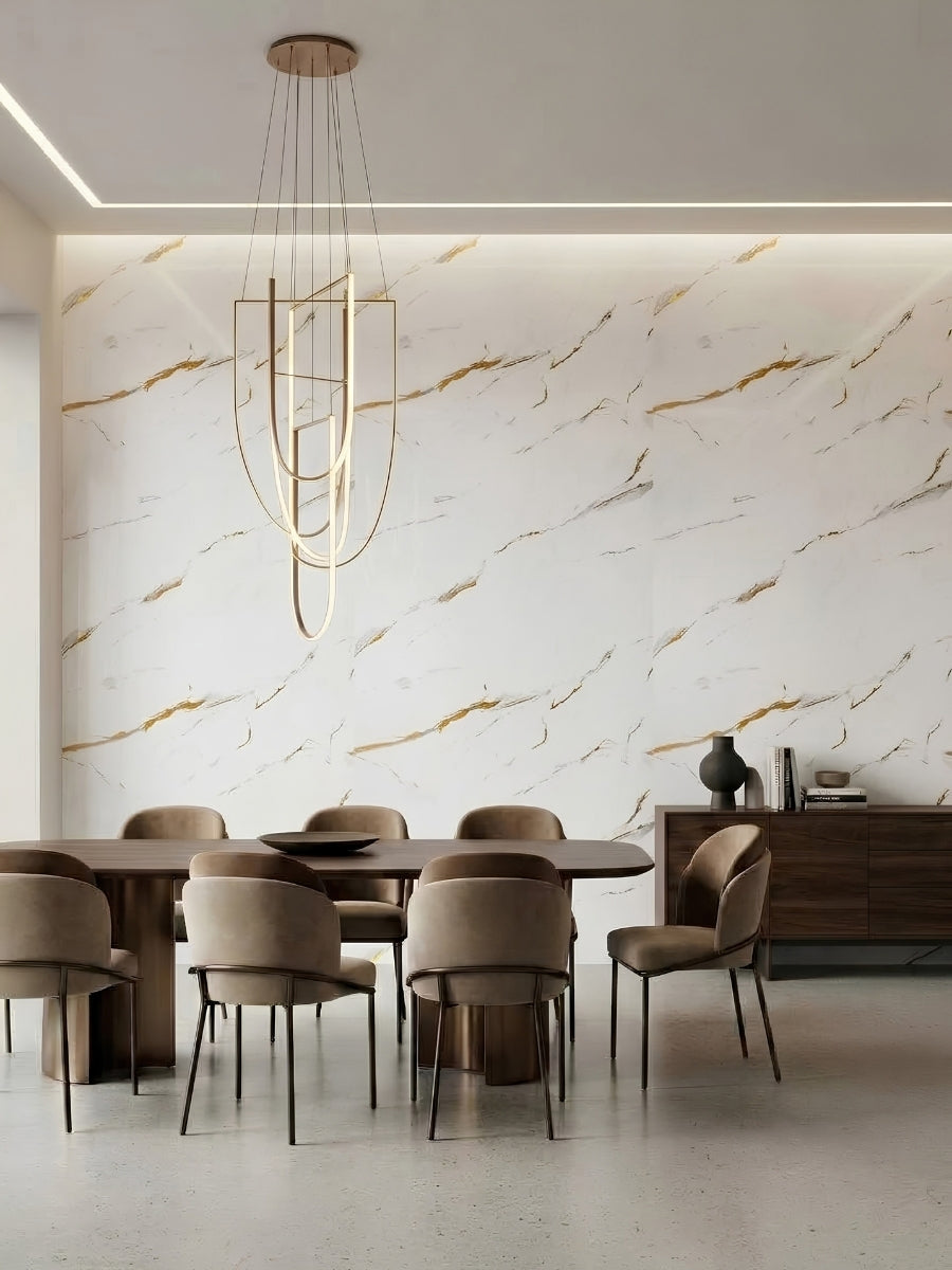 Dining room feature wall finished with white Caramel Vein PVC marble sheets and warm caramel veining