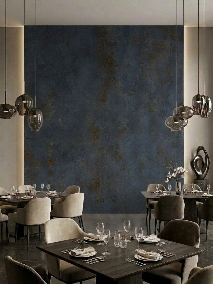 Restaurant dining area featuring a dark charcoal stone-look PVC panel accent wall
