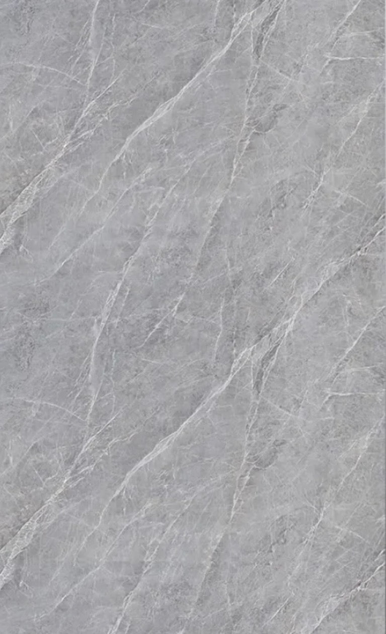 Close-up of a gray PVC marble sheet sample with fine white natural-style veins