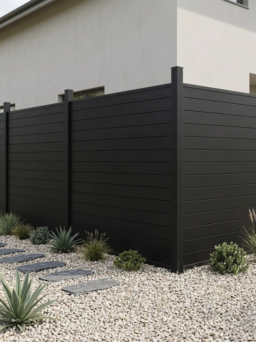 72 x 72-inch black aluminum fence panels enclosing a landscaped gravel garden