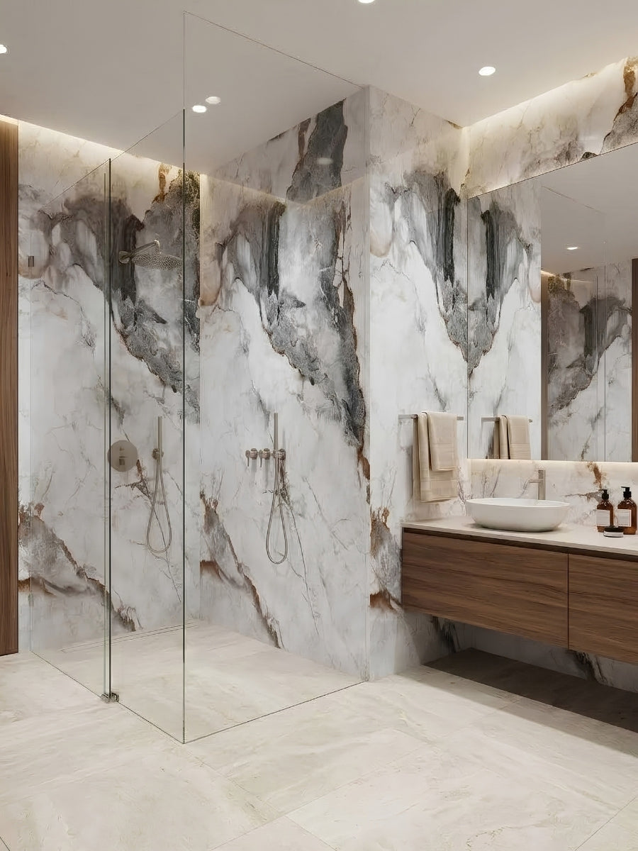 Gray and brown veined marble-look PVC wall panels installed in a modern bathroom and glass shower