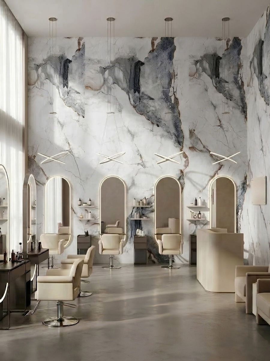 Gray and brown veined marble-look PVC wall panels covering a bright modern salon interior