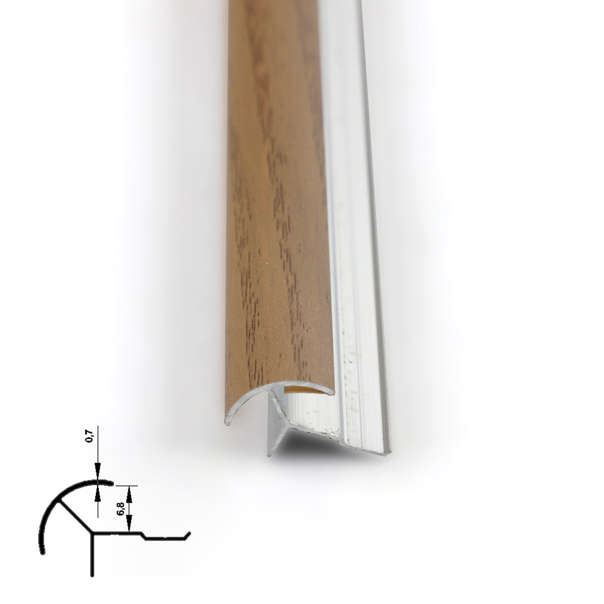Close-up of light oak-look 6.3mm aluminum corner trim showing its curved face and silver profile