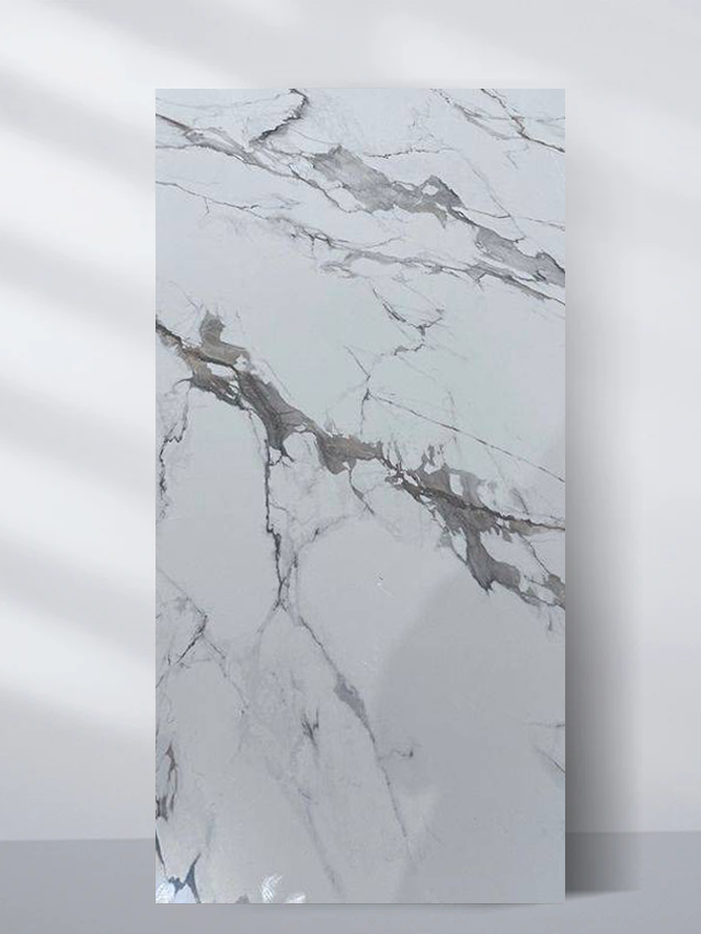White PVC marble sheet sample with sweeping charcoal-gray veins and delicate branching lines