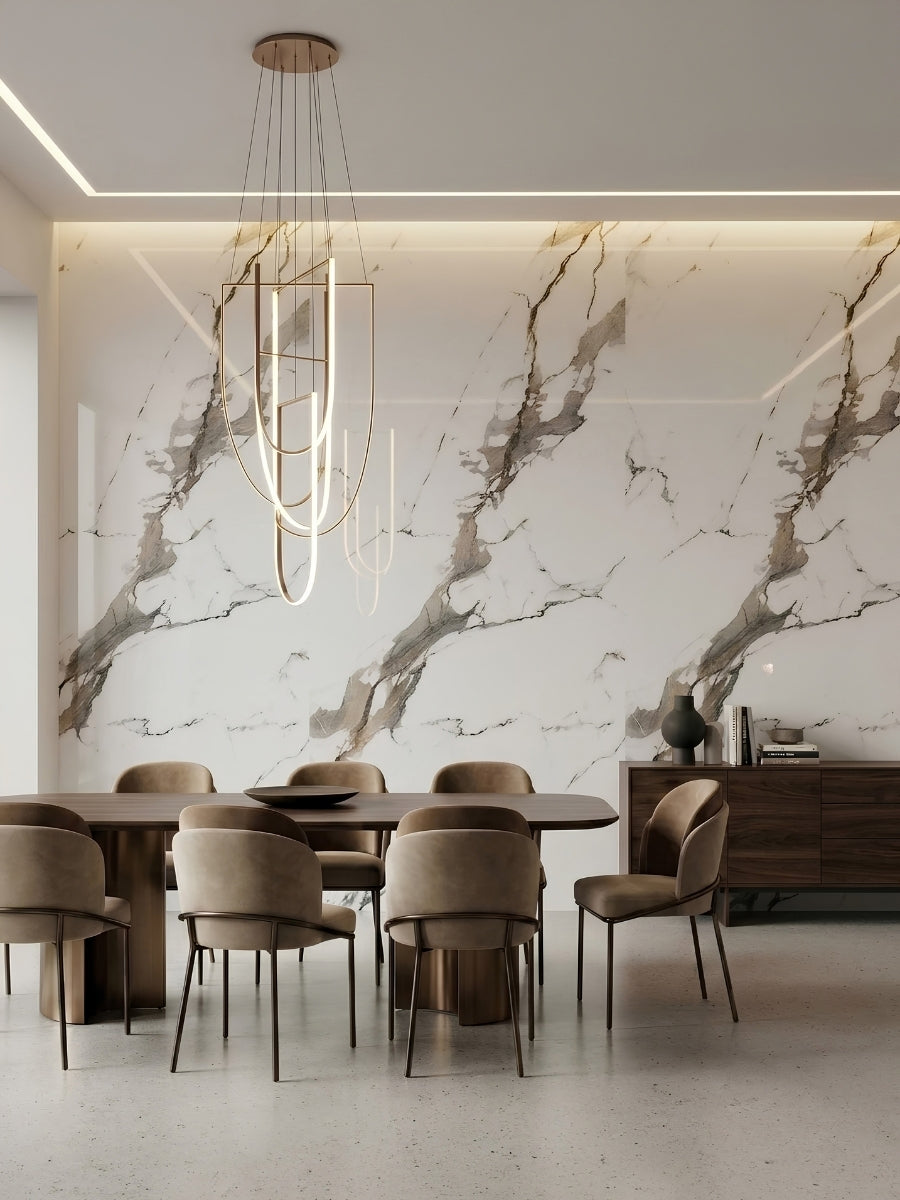 Modern dining room with Moonlit Vein PVC wall panels creating a white, gray, and taupe marble-look accent wall