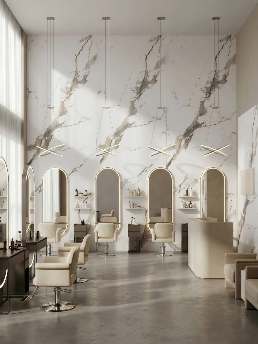 Bright salon interior featuring Moonlit Vein marble-look PVC wall panels behind arched styling stations