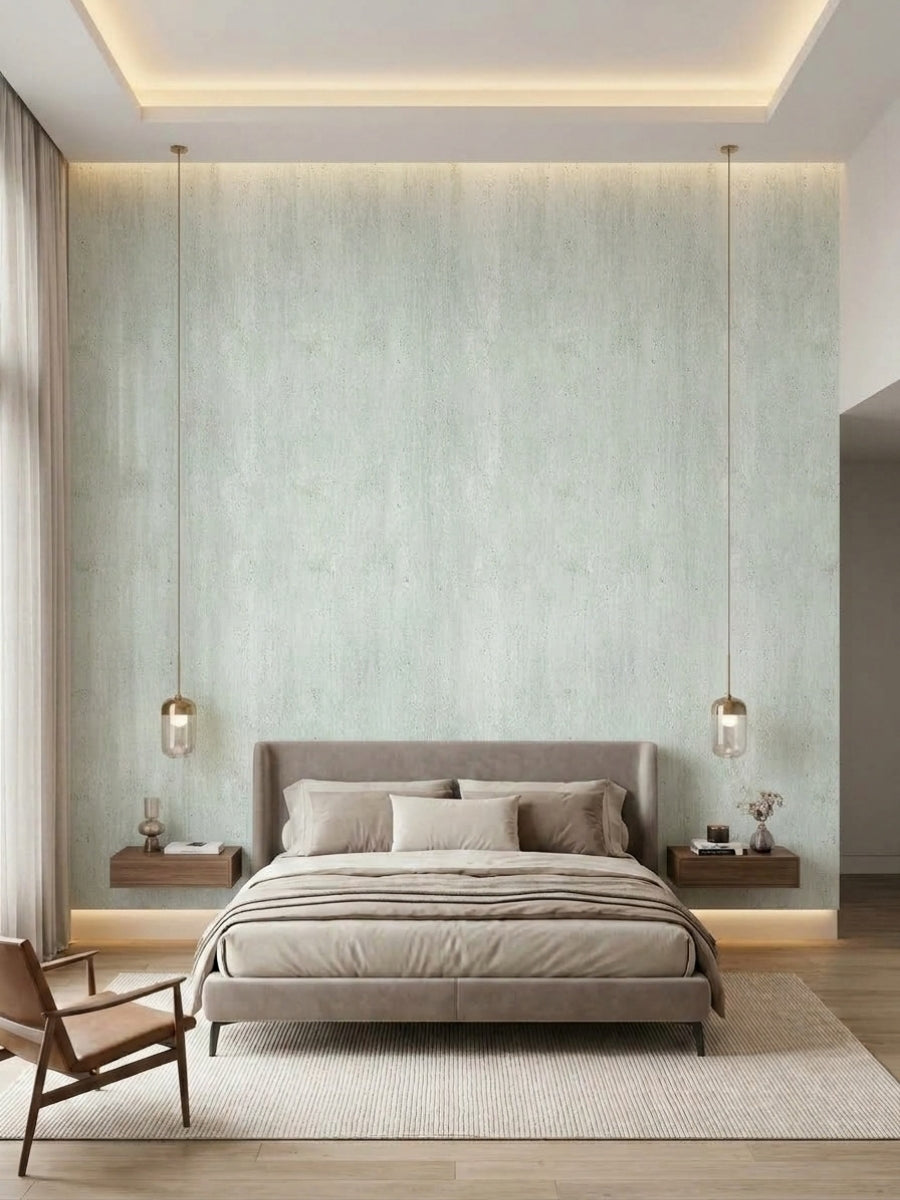 Pale green travertine-look PVC wall panels installed behind a modern upholstered bed