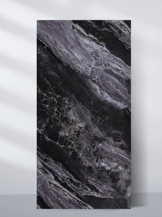 Noir Vein Marble PVC wall panel in a 4 x 8 ft sheet with sweeping gray and violet veining on black