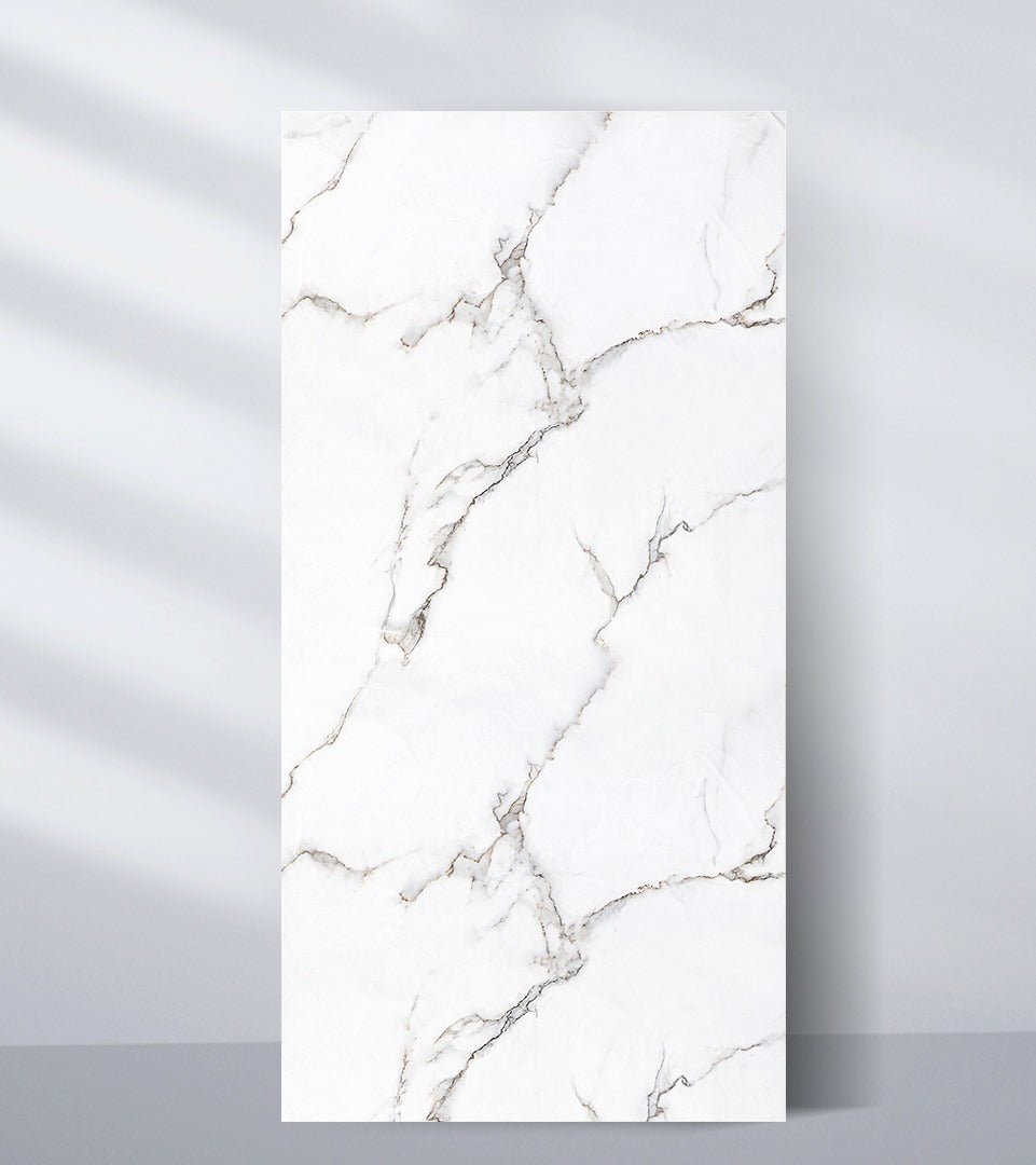 White PVC marble sheet sample with delicate branching gray and warm beige veins