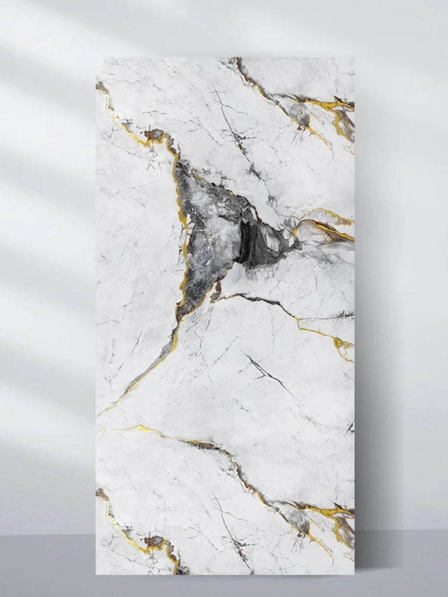 White and deep gray marble-look PVC wall panel with fine black and gold veining, shown upright