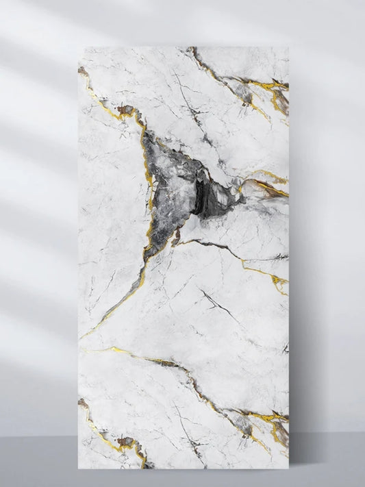 White and deep gray marble-look PVC wall panel with fine black and gold veining, shown upright