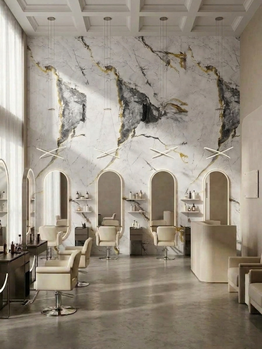 Deep gray and gold-veined white marble PVC wall panels installed in a bright salon interior