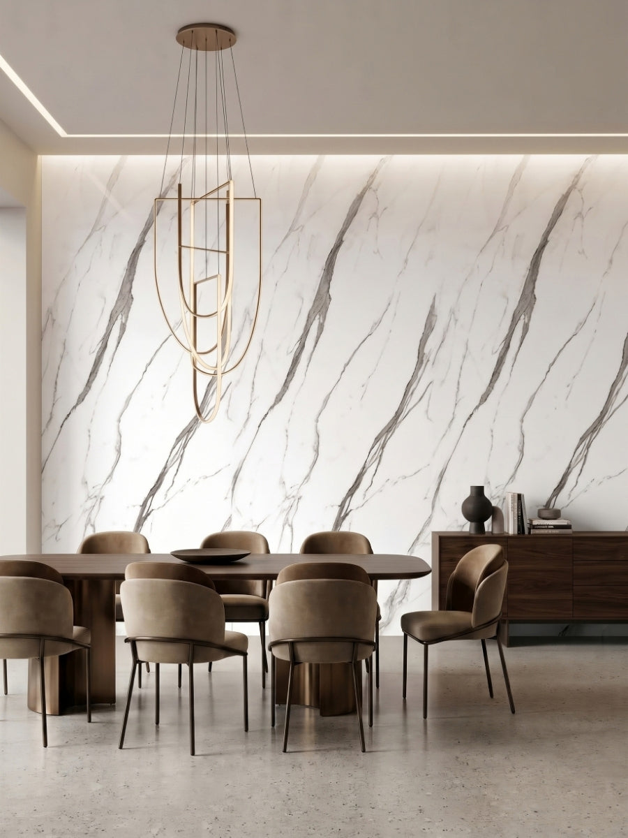 Dining room accent wall clad in white marble-look PVC panels with sweeping gray veining