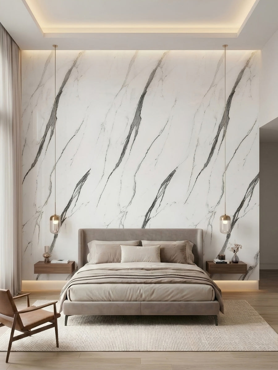 White marble-look PVC panels with dramatic gray veins installed as a bedroom accent wall