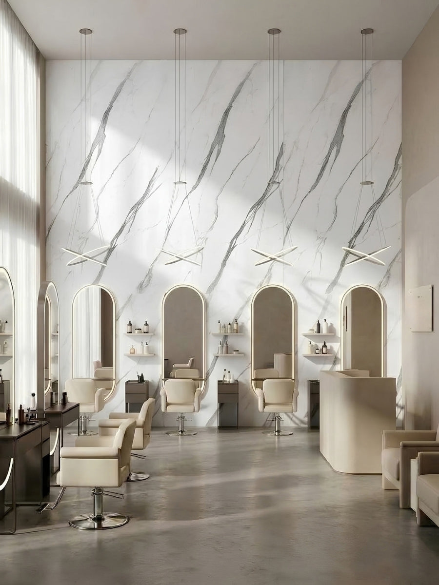 White matte marble-look PVC wall panels creating a bright feature wall in a modern salon