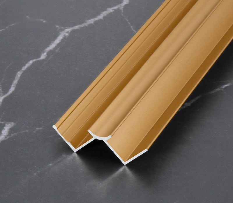 Gold aluminum wall panel trim H-joint profile, durable metal connector for joining decorative wall panels with a sleek modern finish